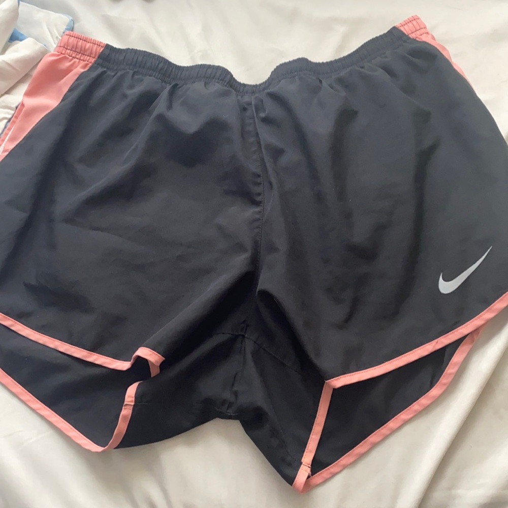 Black pink and white Nike shorts
